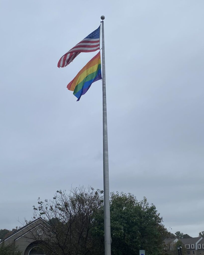 Laurel pride flag and American flag